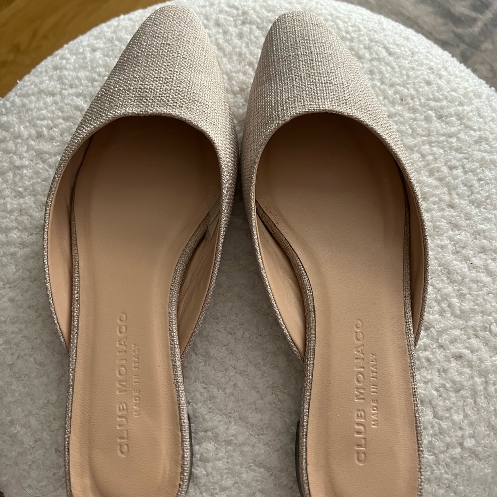Like new Club Monaco slides in a neutral canvas